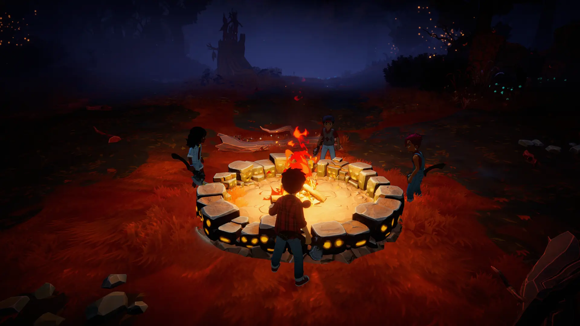 The party regroups around a campfire at night